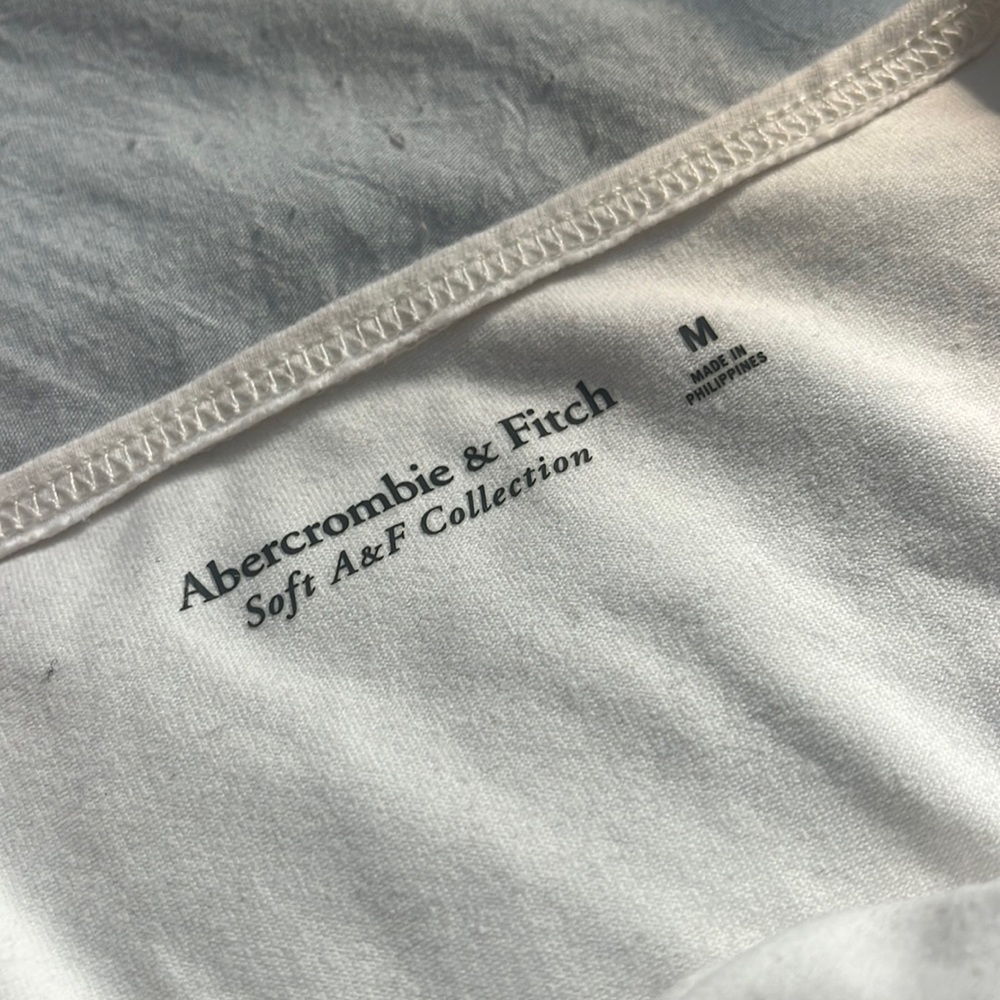 Abercrombie and Fitch, white long sleeve bodysuit with twist front